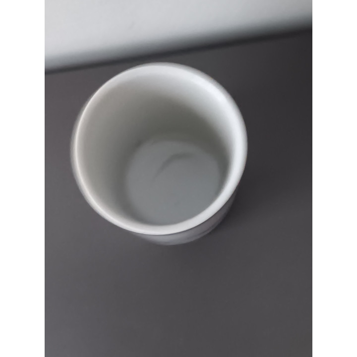 Lepelvaasje keramiek wit met blauwe rand