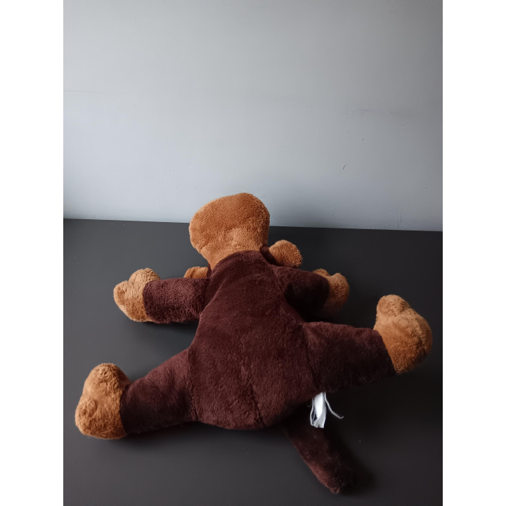 Grote liggende aap knuffel bruin | Angelique’s Kringloop