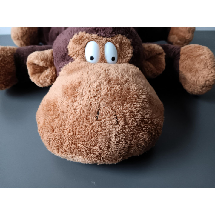 Grote liggende aap knuffel bruin | Angelique’s Kringloop