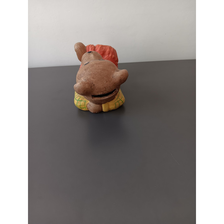 Vintage spaarpot beer liggend