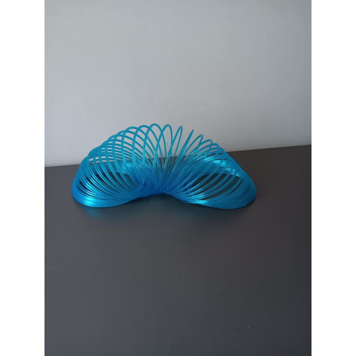 Blauwe slinky springveer speelgoed 6,5 cm