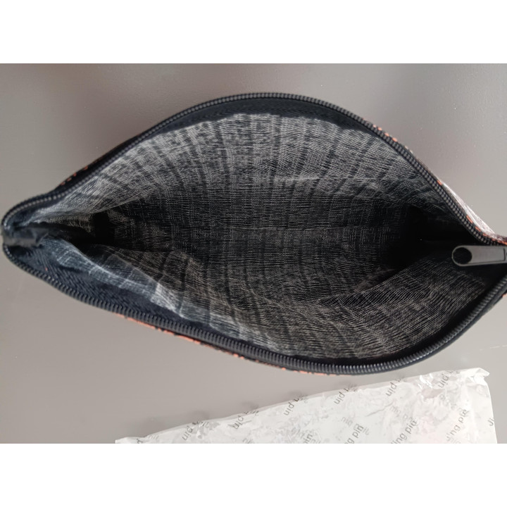 Make-uptasje koperkleur met bloemmotief