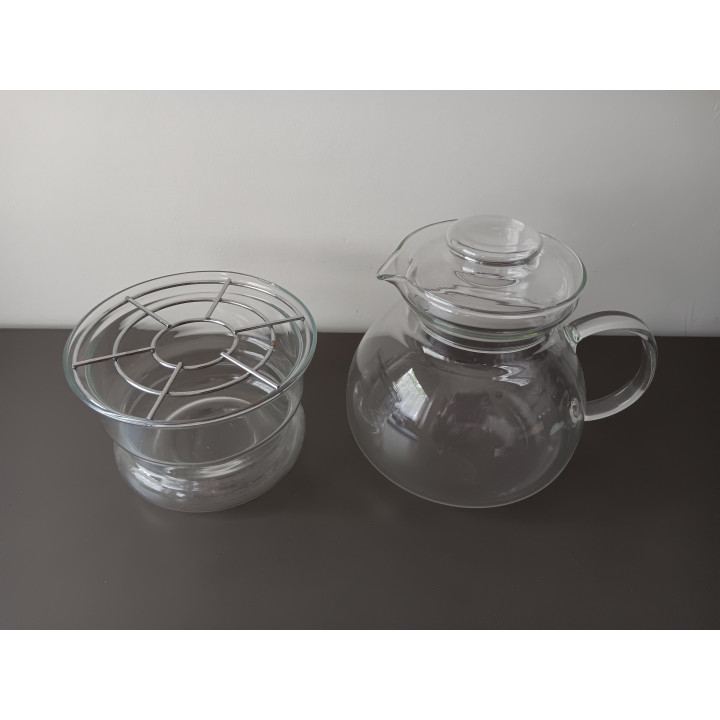 Glazen theepot met warmhouder en metalen rooster