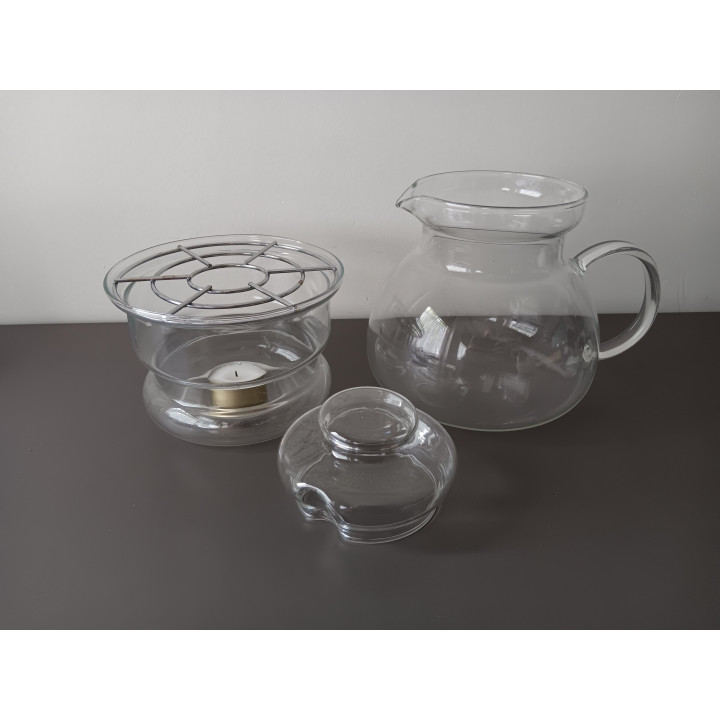 Glazen theepot met warmhouder en metalen rooster
