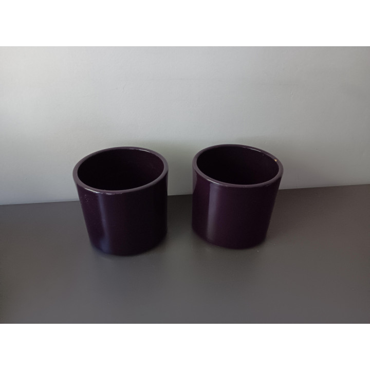 Set paarse keramieken bloempotten