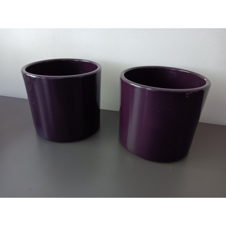 Set paarse keramieken bloempotten