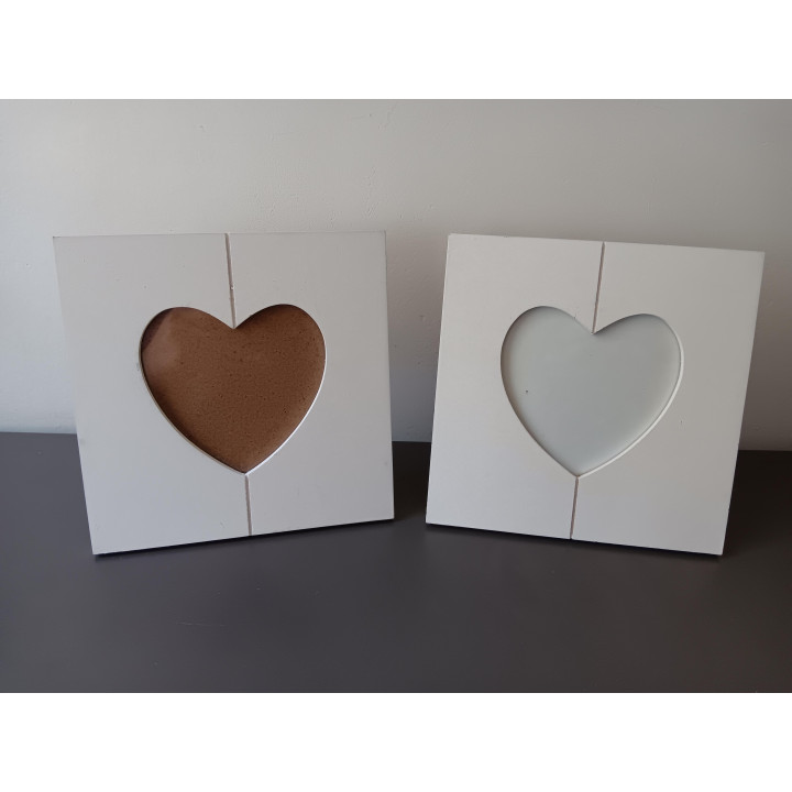 2 witte fotolijstjes hartvorm 16x16