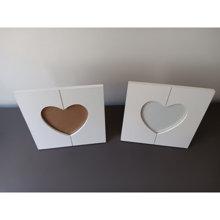 2 witte fotolijstjes hartvorm 16x16