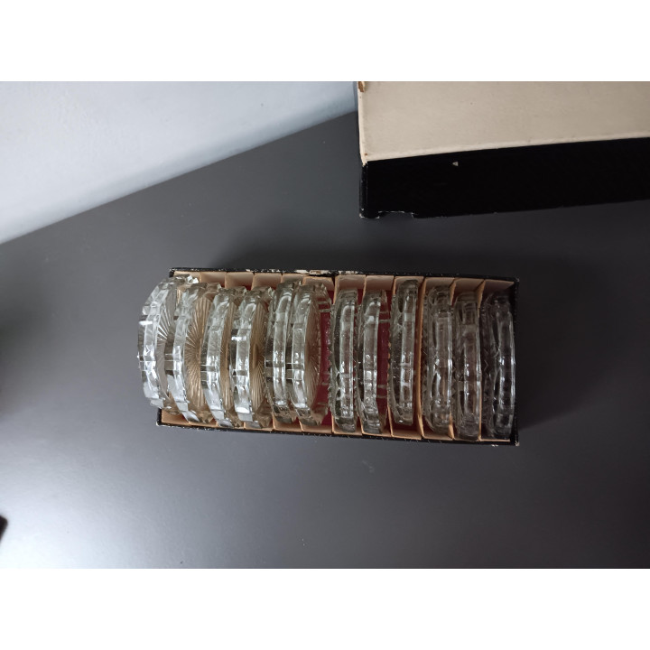 Set van 12 glazen onderzetters in originele doos