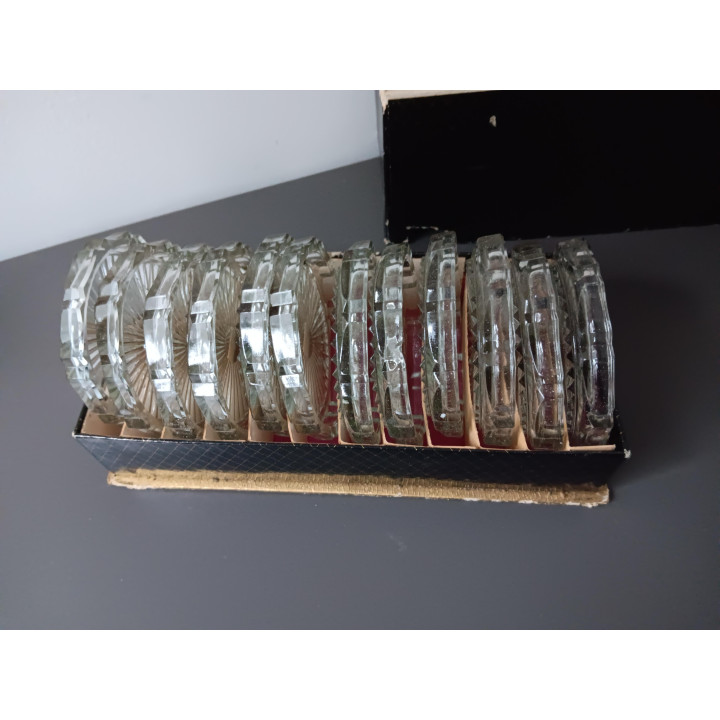 Set van 12 glazen onderzetters in originele doos