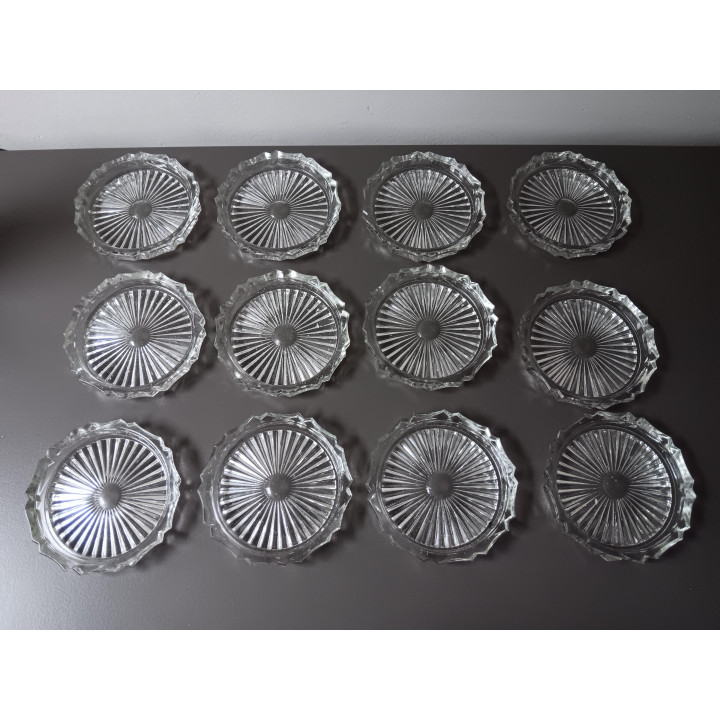 Set van 12 glazen onderzetters in originele doos