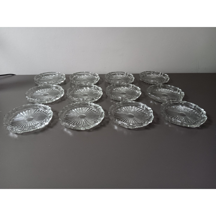 Set van 12 glazen onderzetters in originele doos