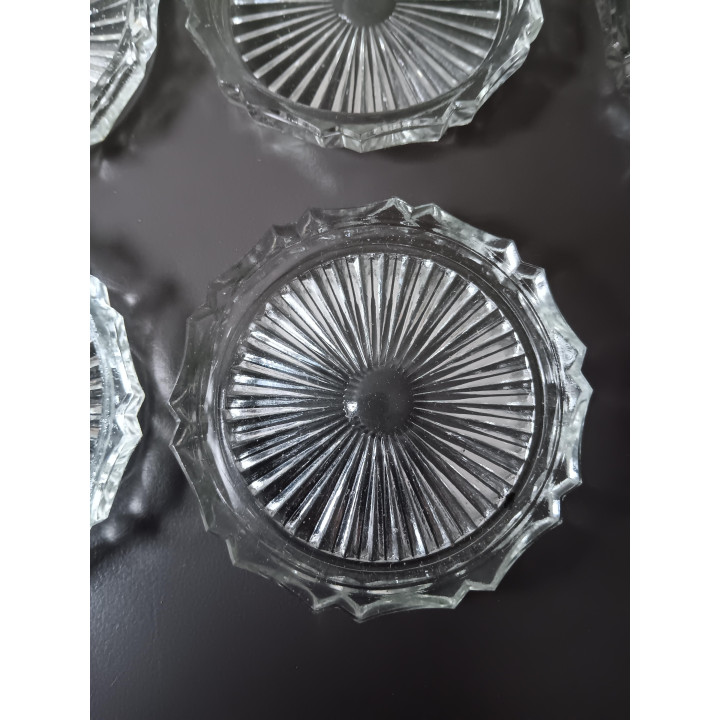 Set van 12 glazen onderzetters in originele doos