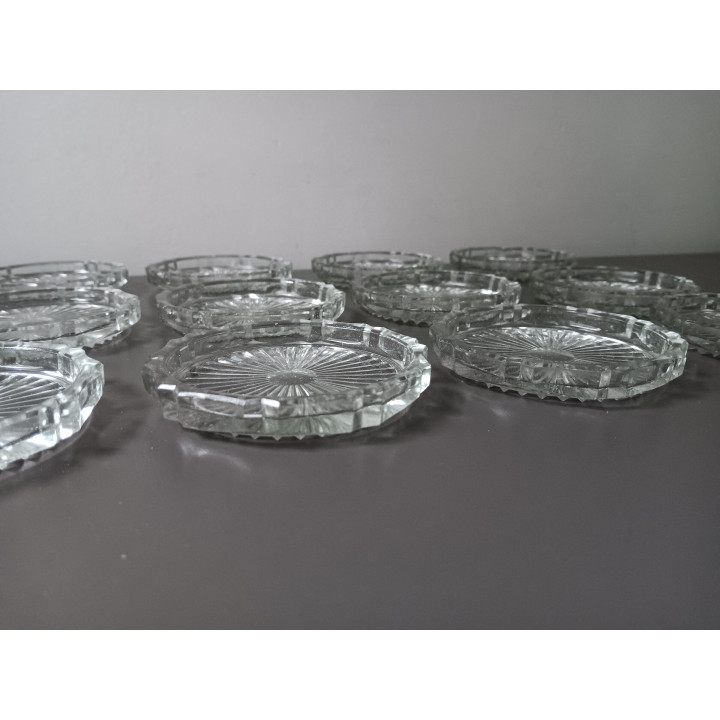 Set van 12 glazen onderzetters in originele doos