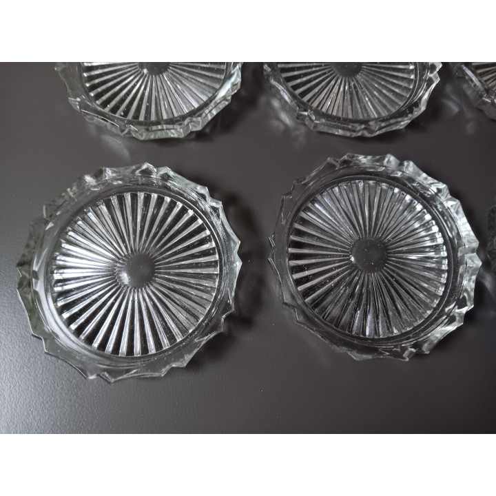 Set van 12 glazen onderzetters in originele doos