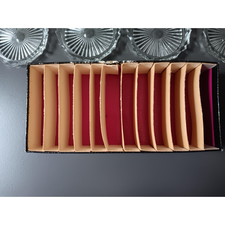 Set van 12 glazen onderzetters in originele doos