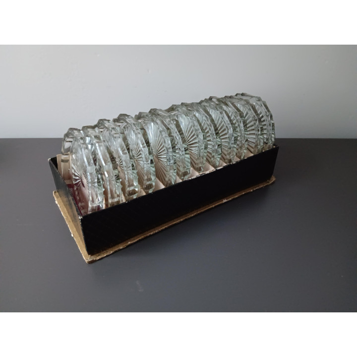 Set van 12 glazen onderzetters in originele doos