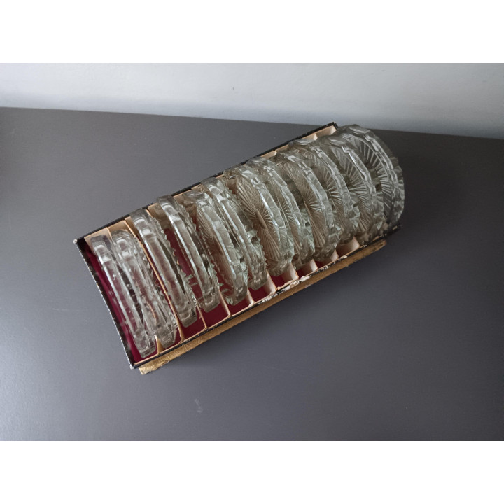 Set van 12 glazen onderzetters in originele doos