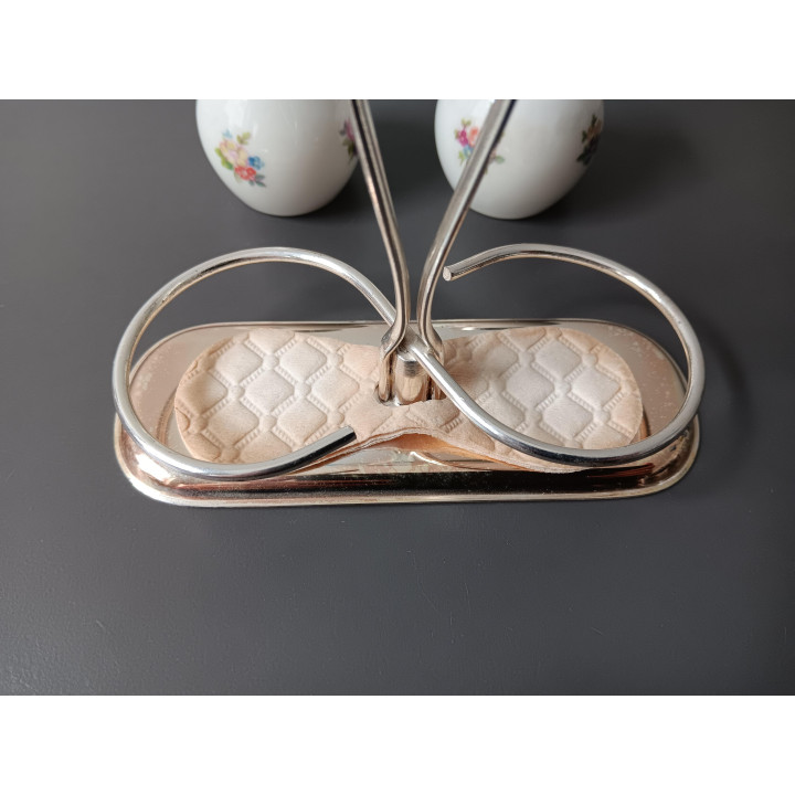 Vintage zout en peper stel op metalen houder