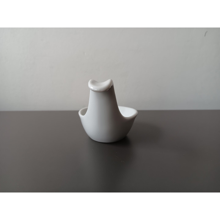 Witte keramische amuselepel