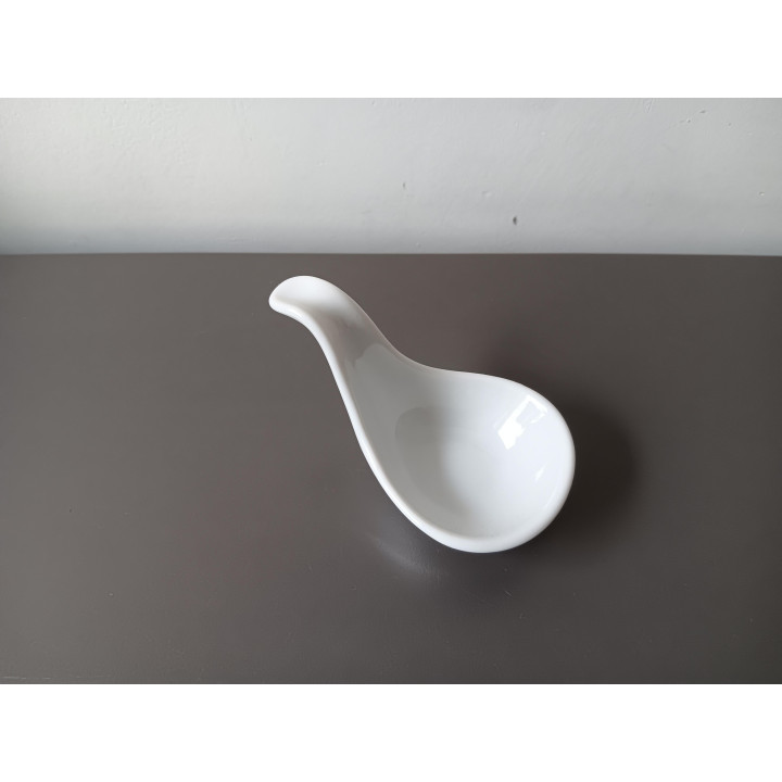 Witte keramische amuselepel