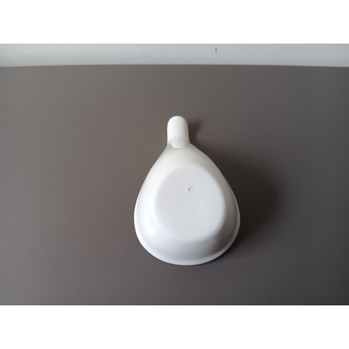 Witte keramische amuselepel