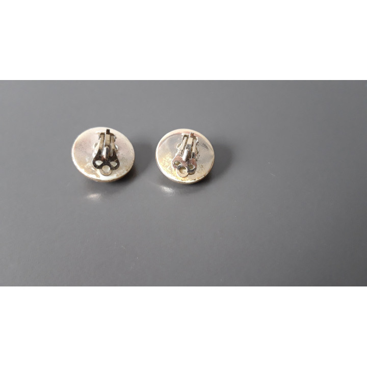 Paarse ronde clip oorbellen