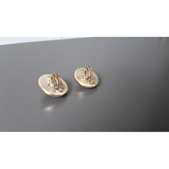 Paarse ronde clip oorbellen