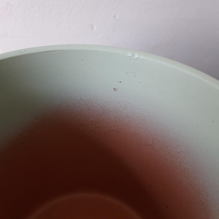 Lichtgroene keramieken bloempot