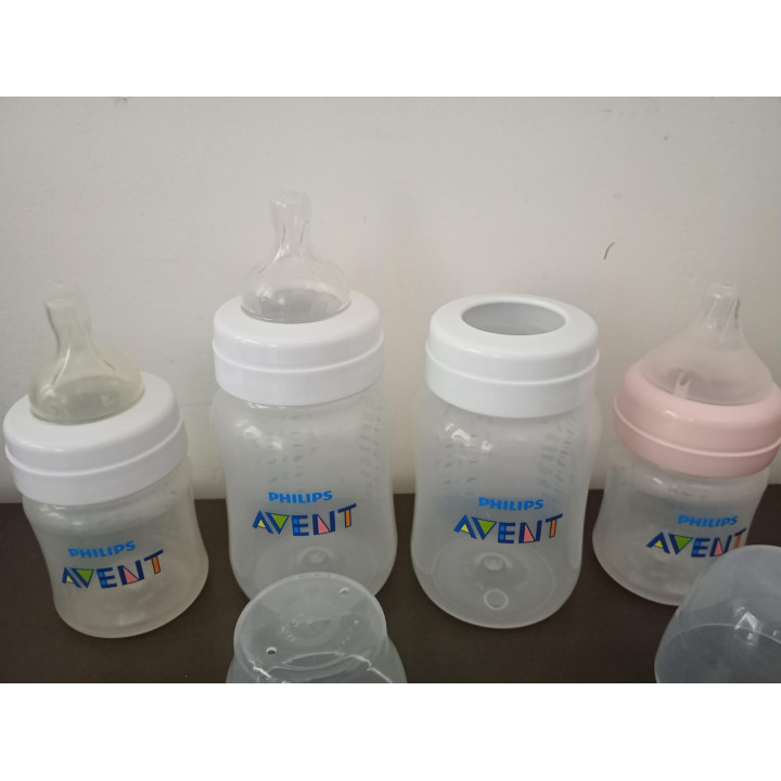 4 Philips Avent babyflessen met sterilisatiedoosjes