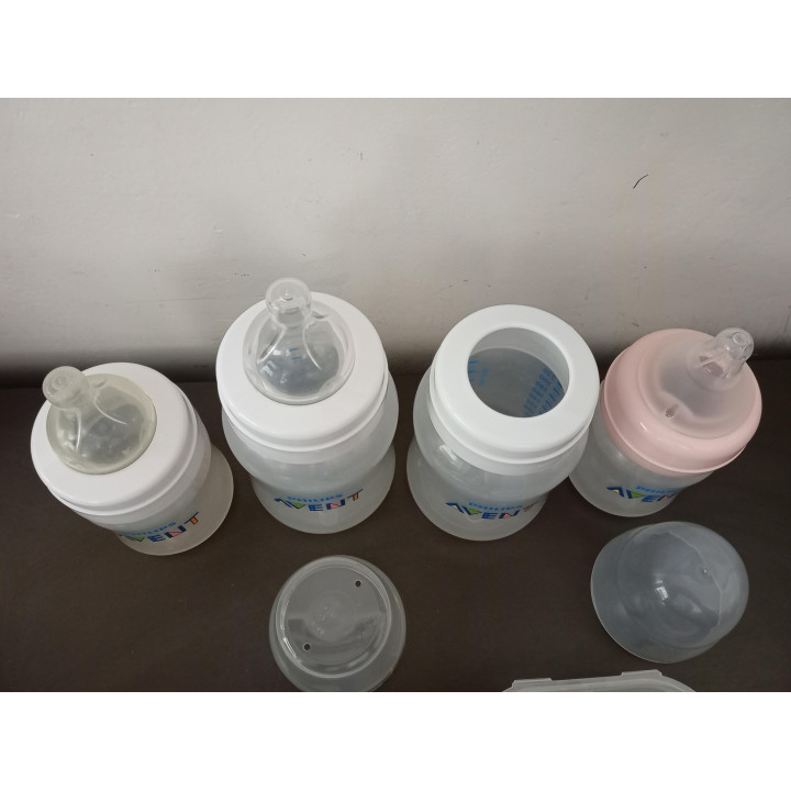 4 Philips Avent babyflessen met sterilisatiedoosjes