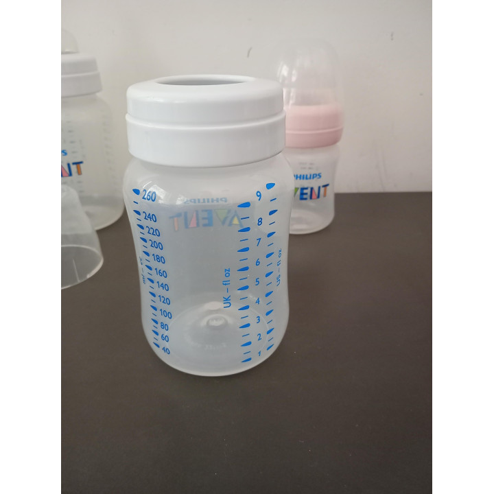 4 Philips Avent babyflessen met sterilisatiedoosjes