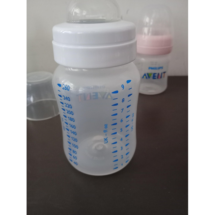 4 Philips Avent babyflessen met sterilisatiedoosjes