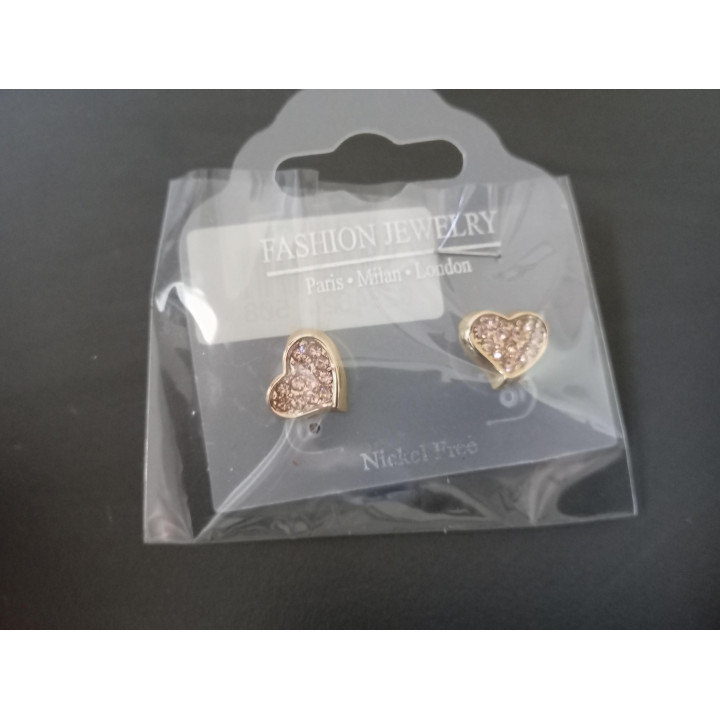 Goudkleurige hart oorstekers met roze strass