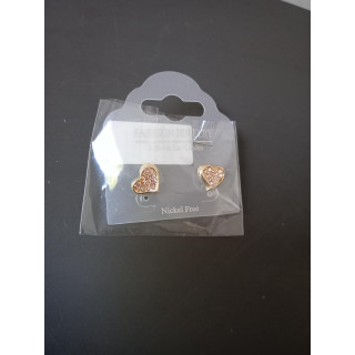 Goudkleurige hart oorstekers met roze strass