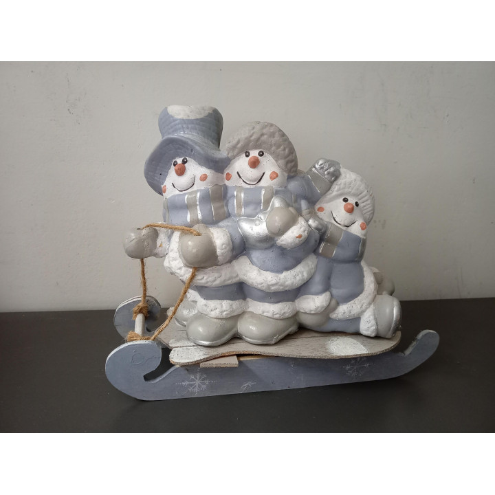 Kerstdecoratie drie sneeuwpoppen op slee met kaarshouders
