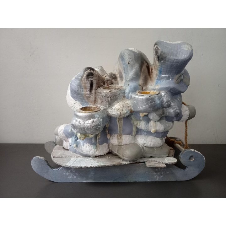 Kerstdecoratie drie sneeuwpoppen op slee met kaarshouders