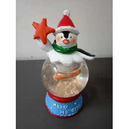 Kerst sneeuwbol met pinguïn en ster Happy Holidays